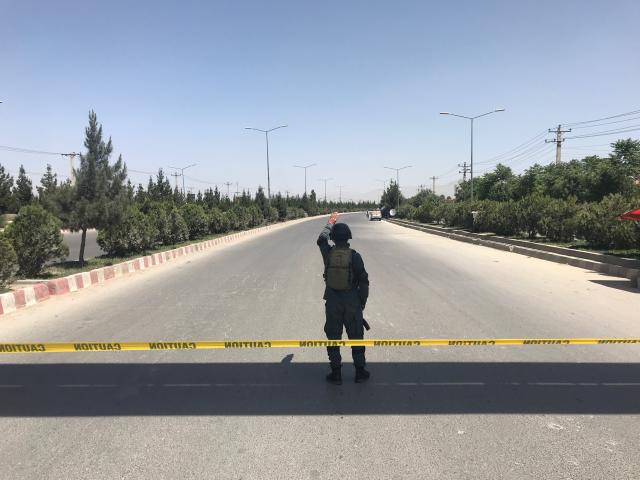 Car bomb and gunfire near Afghan interior ministry in Kabul 
 