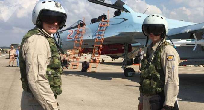 Putin says Russia has withdrawn 1,140 military personnel and 13 warplanes from Syria