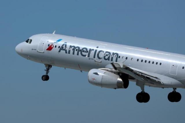 American Airlines warns of fare increases if oil remains high
 