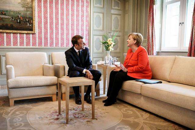 Merkel, Macron back euro zone budget in 