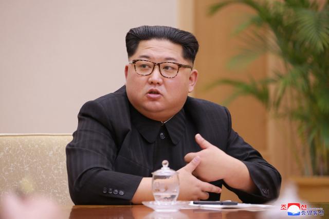 Kim Jong Un impersonator says detained for hours at Singapore airport
 