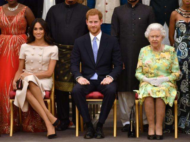 Harry and Meghan greet young leaders at Queen