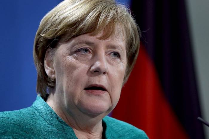 Merkel veut des solutions aux "tendances agressives" de l