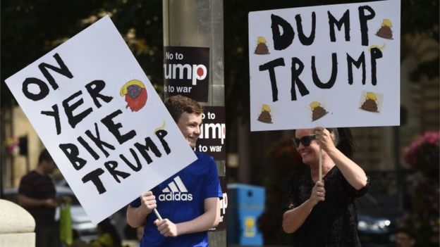 Trump arrives in Scotland amid protests