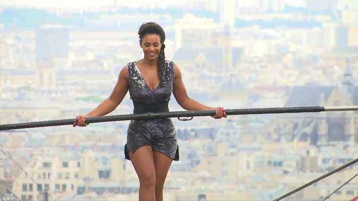 Tightrope walker achieves 35m high stunt in Paris - NO COMMENT