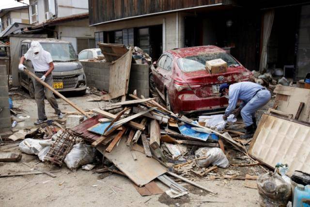 Japan struggles to restore water to flood-hit towns
 