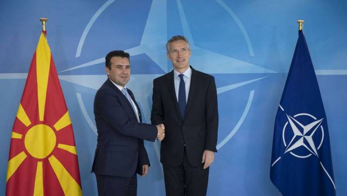 NATO formally invites Macedonia to join alliance