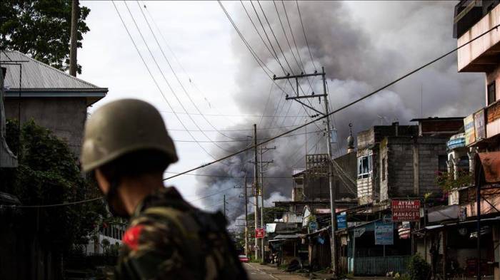 Van explosion kills 10 at checkpoint in Philippine south