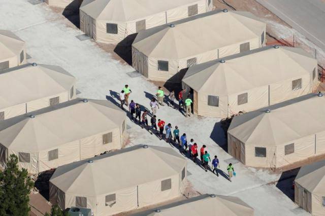 U.S. moving some detained migrants to sites closer to their children: HHS secretary