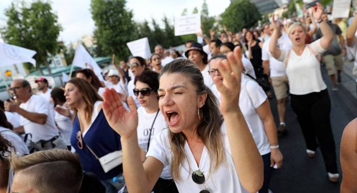 Cyprus school teachers take to streets to protest education reform