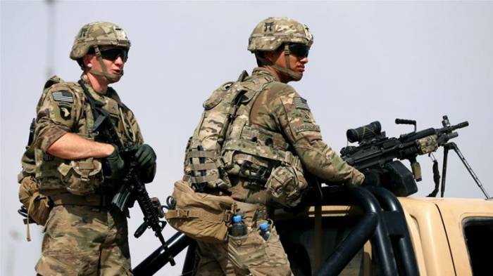 Why are UK and US sending more troops to Afghanistan?