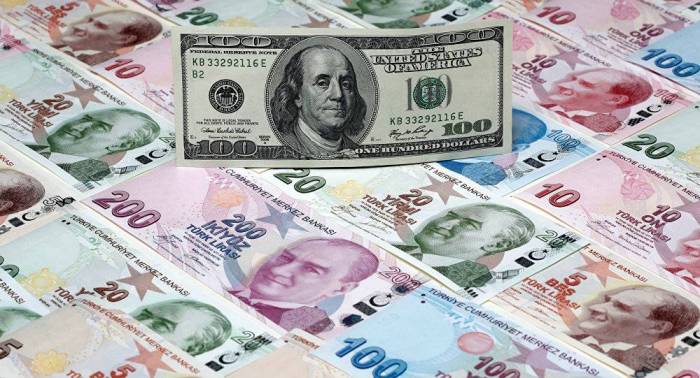 العملة التركية تنخفض وأمريكا تحذر من عقوبات جديدة