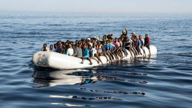 Libya evacuates with U.N. help migrants trapped by Tripoli clashes