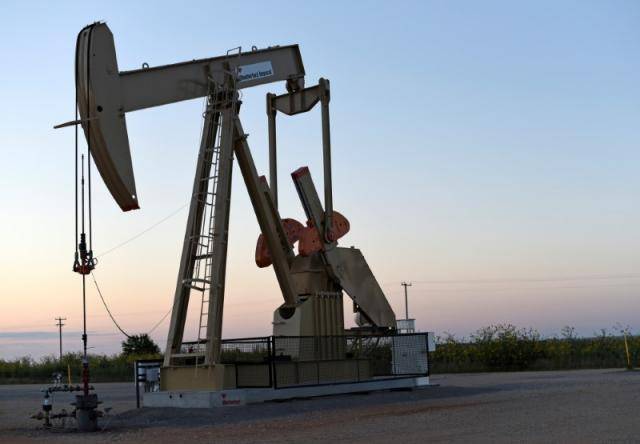 Oil prices rebound after heavy declines over trade dispute
 