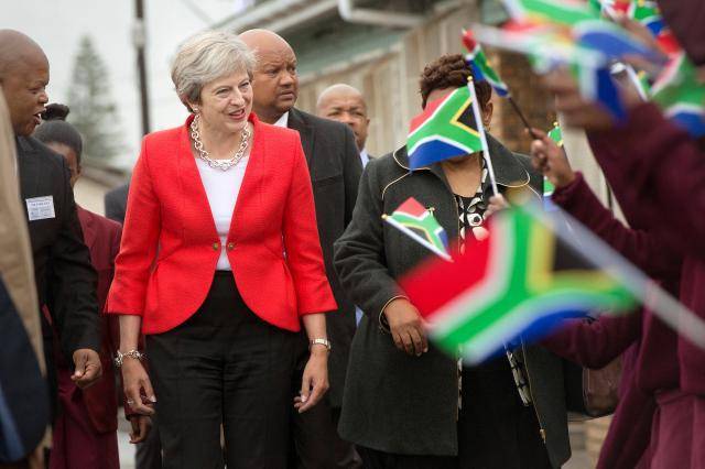 Britain supports South African land reform: PM May
 