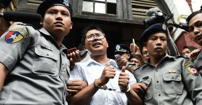 Myanmar jails Reuters journalists for 7 years in 