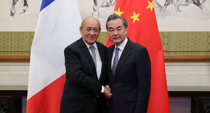 Ministros de Exteriores de China y Francia se oponen a políticas unilaterales