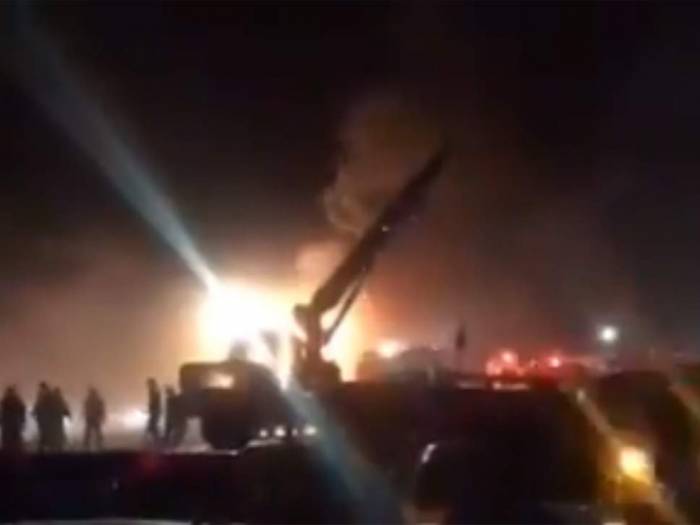 Iran bus crash kills at least 21 after collision with oil tanker sparks inferno