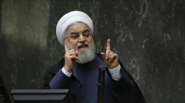 Iranischer Präsident Hassan Rohani sieht sein Land im Krieg mit den USA