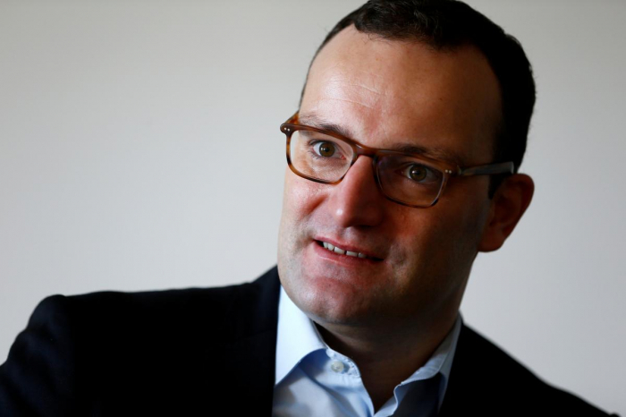 Merkel critic Spahn also wants party leadership: sources
