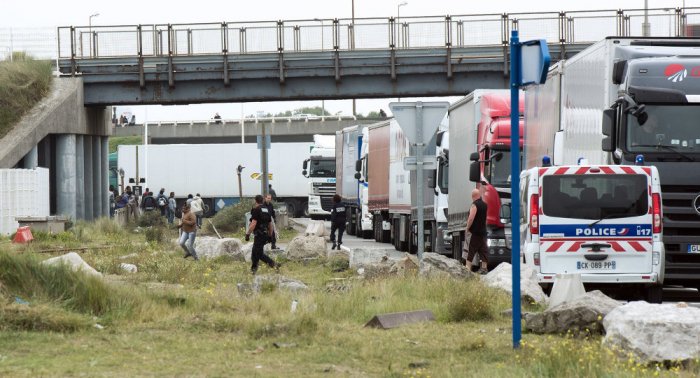 Police discover 21 migrants huddled in refrigerated lorry in Sussex