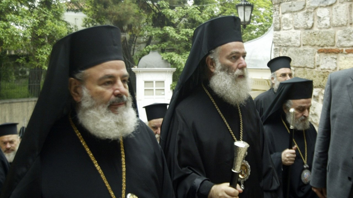Greece to take clergy off its payroll in bid to separate church, state