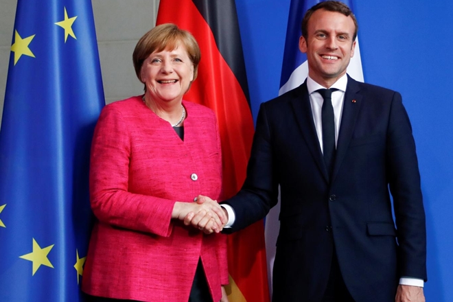 Vorschlag von Merkel und Macron für Euro-Etat eckt in Rom an