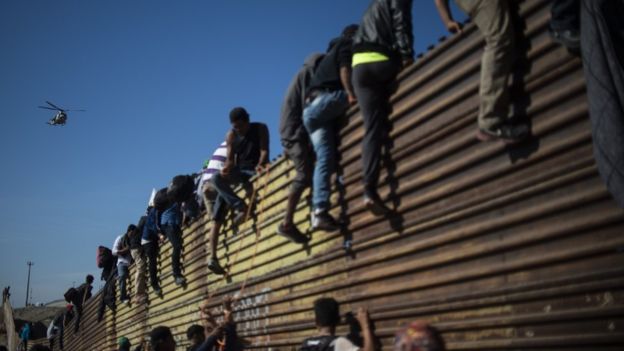 Migrant caravan: Mexico to deport group which stormed US border