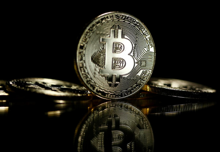 Bitcoin falls over 7 percent, heads towards one-year low