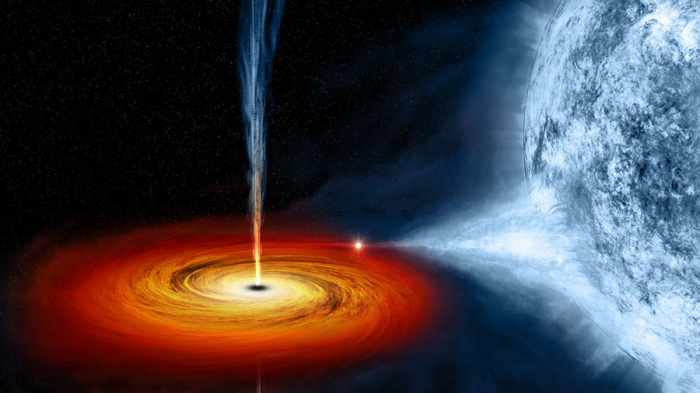 Massive black hole’s spectacular spin ‘may rotate space around it’