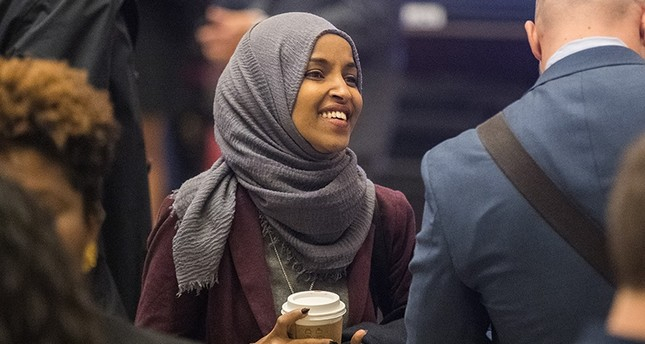 Newly-elected US Rep. Omar aims to end ban on religious headwear