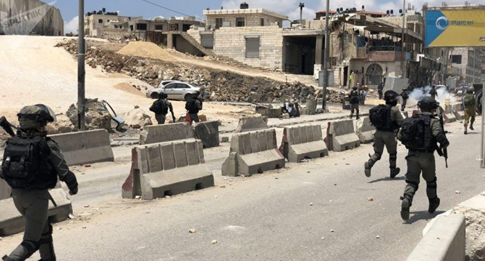 مواجهات بين فلسطينيين والجيش الإسرائيلي في رام الله بعد إصابة 6 إسرائيليين بإطلاق نار