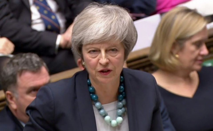 Theresa May annonce au parlement le report du vote sur l
