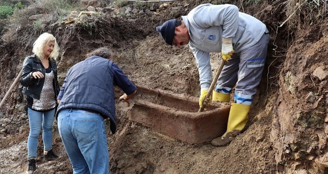 Roman-era tomb revealed after heavy rain triggers landslides in southwestern Bodrum
