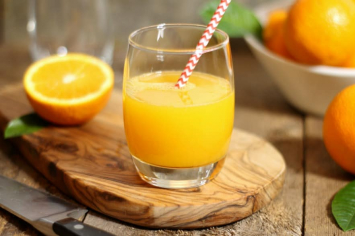 Drinking orange juice could slash your risk of dementia by 50 %