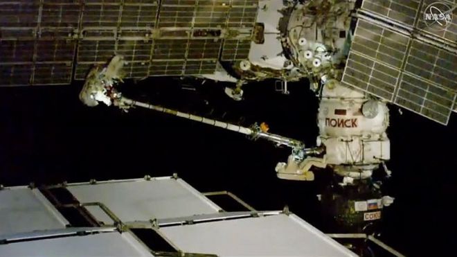 ISS: Spacewalk cosmonauts investigate mystery hole