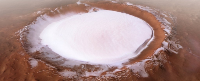   Photos show huge crater on Mars absolutely brimming with water ice  