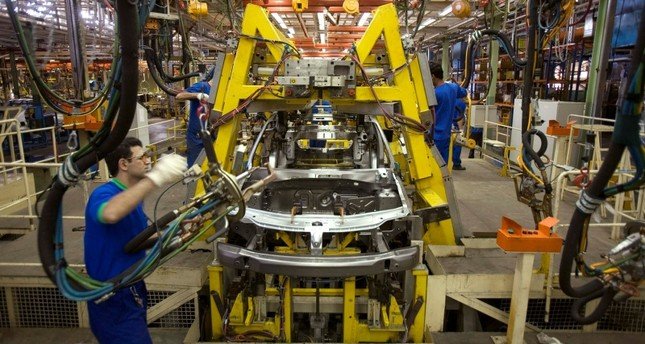 China says will halt additional tariffs on US cars amid trade truce
