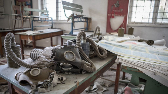 Haunting photos show dozens of gas masks littering Chernobyl