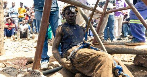 Zimbabwean rescuers pull 22 bodies from mine, eight more found alive