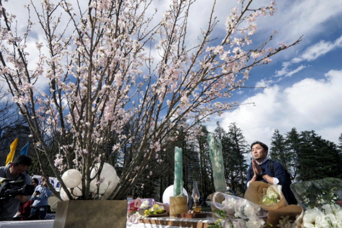 Le Japon commémore la triple tragédie du 11 mars 2011