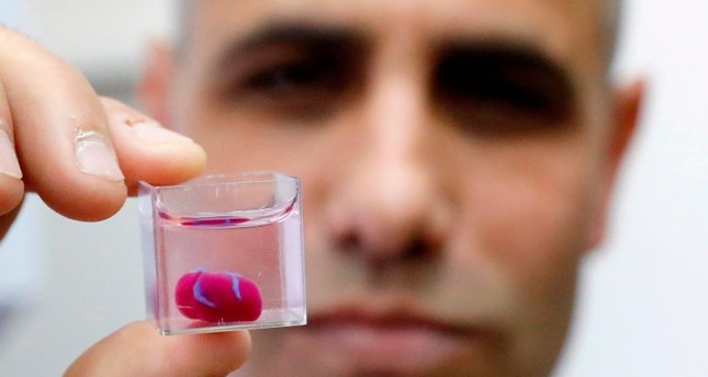 Scientists create first 3D print of heart with human cells, vessels