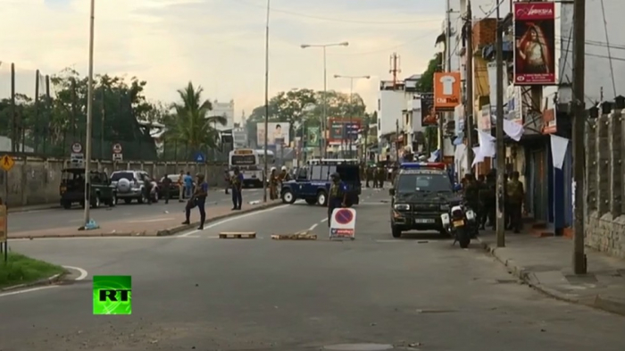   Blast hits van near Colombo church as bomb squad tried to defuse it -   WATCH LIVE    