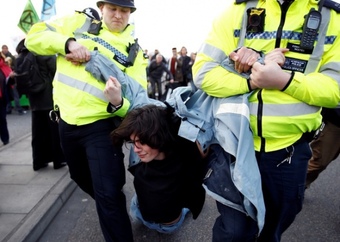 UK police arrest 113 environmental activists in London