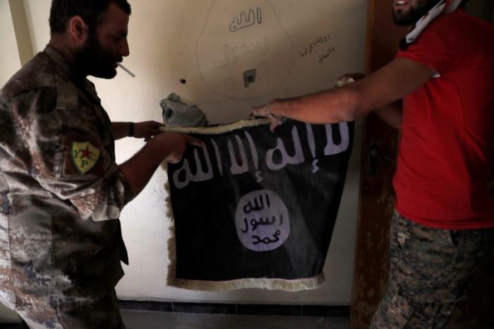 Iraq court sentences four to death for joining IS