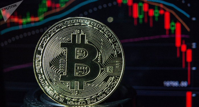 Le bitcoin passe brièvement la barre des 9.000 USD, son plus haut depuis un an