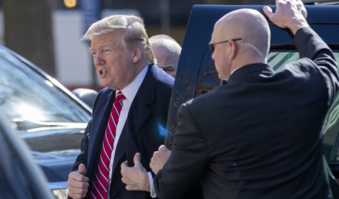   Police accompanying Trump