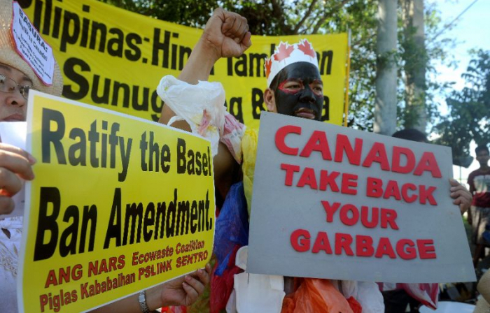 Philippines recalls its envoys in Canada over tons of rotting garbage
