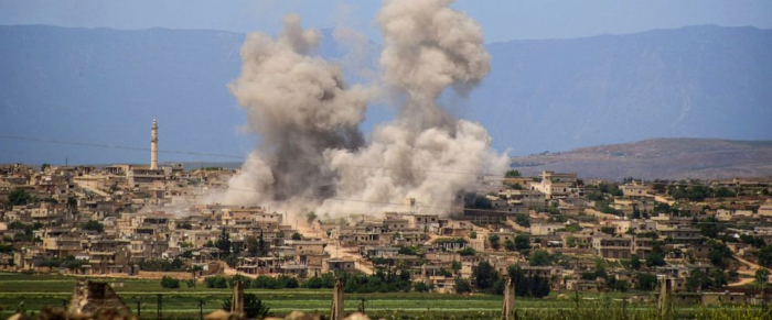 Russia says Syrian government forces halt fire in Idlib