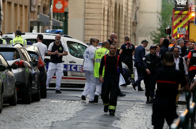 French police hunt suitcase bomber after blast in Lyon  